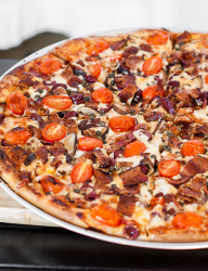 Loaded pizza that you can make from the comfort of your own home | BakingGlory.com #pizza #bakery #recipe #mushrooms #capers
