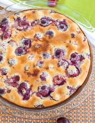 Freshly baked clafoutis with fresh cherries