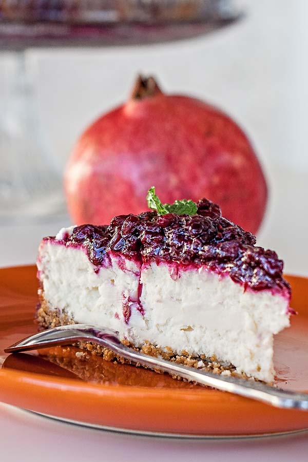 Delicious dessert with loads of berries and pomegranate seeds