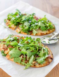 Fresh ingredients served on a pizza flatbread