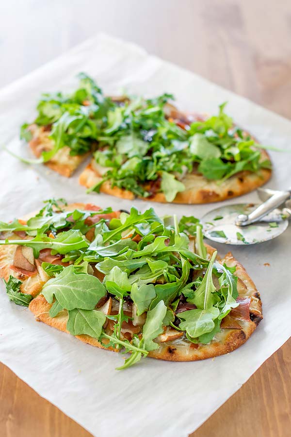 Fresh ingredients served on a pizza flatbread